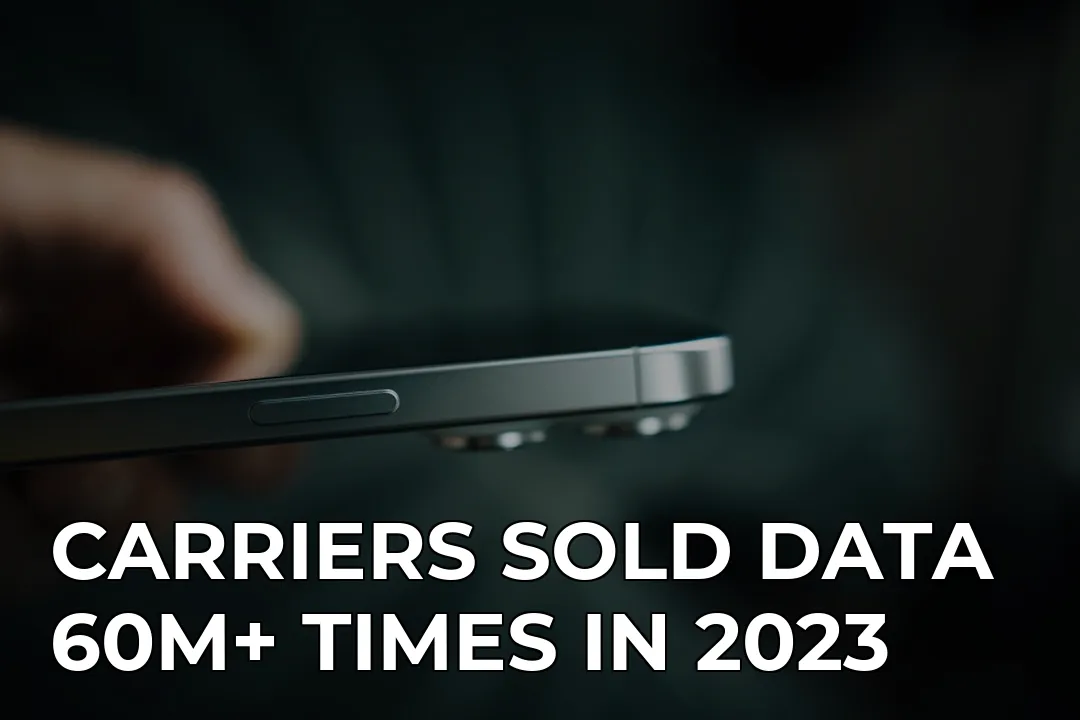 A close up of a person holding a cell phone — CARRIERS SOLD DATA 60M+ TIMES IN 2023